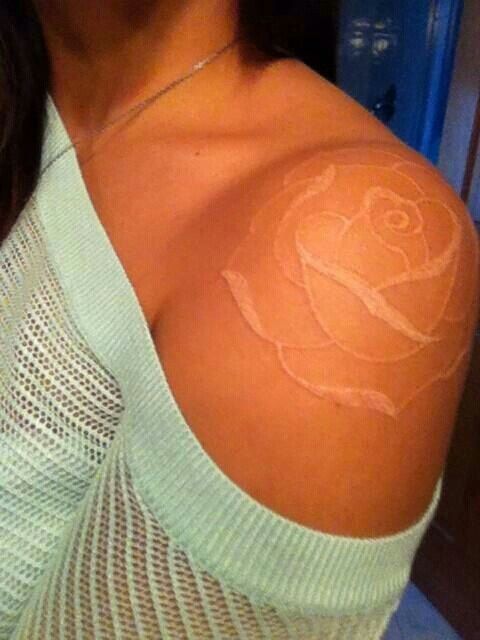 Big rose shoulder tattoo